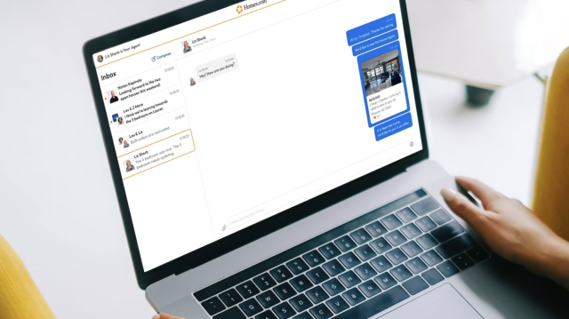 homes.com messages on a laptop